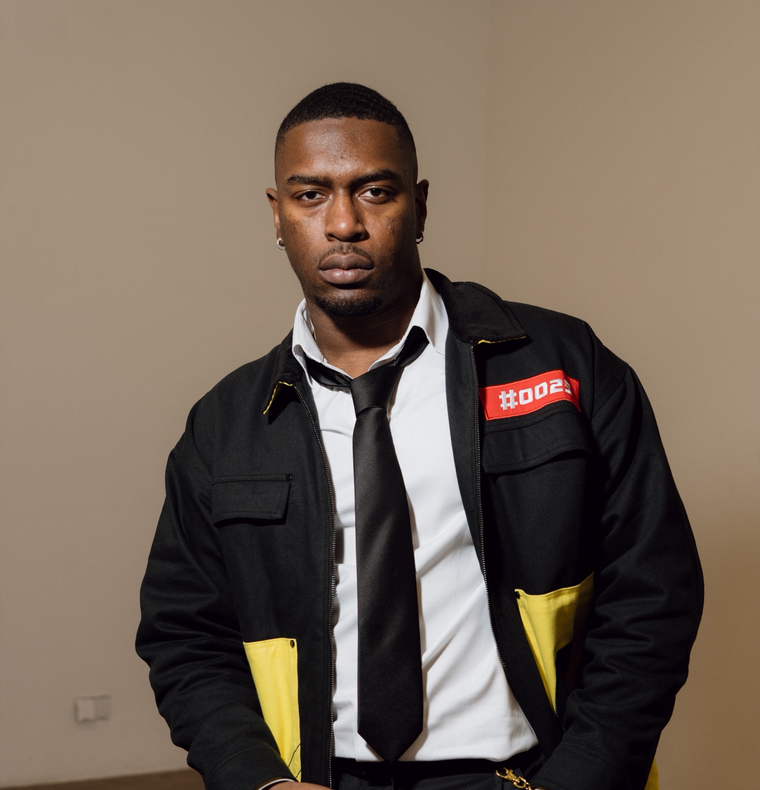 Josiah Campbell photographed for the Pokémon x Jimmy Paul collection at London Fashion Week